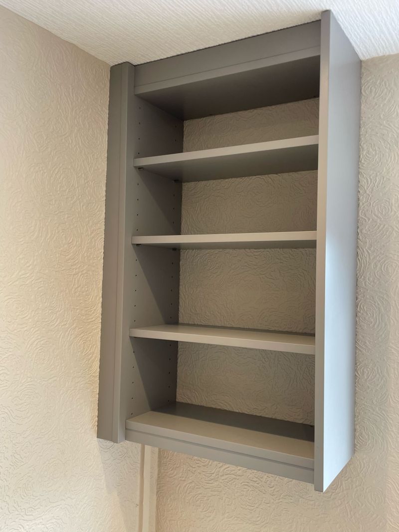 Adjustable shelving cabinet finished in FB Worsted: Swipe To View More Images