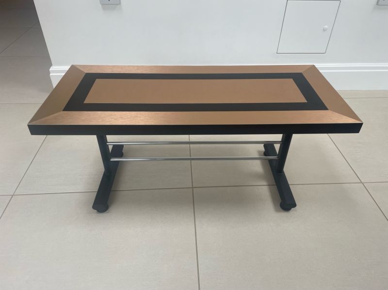 Upcycled coffee table. Laminated in copper and black.: Swipe To View More Images